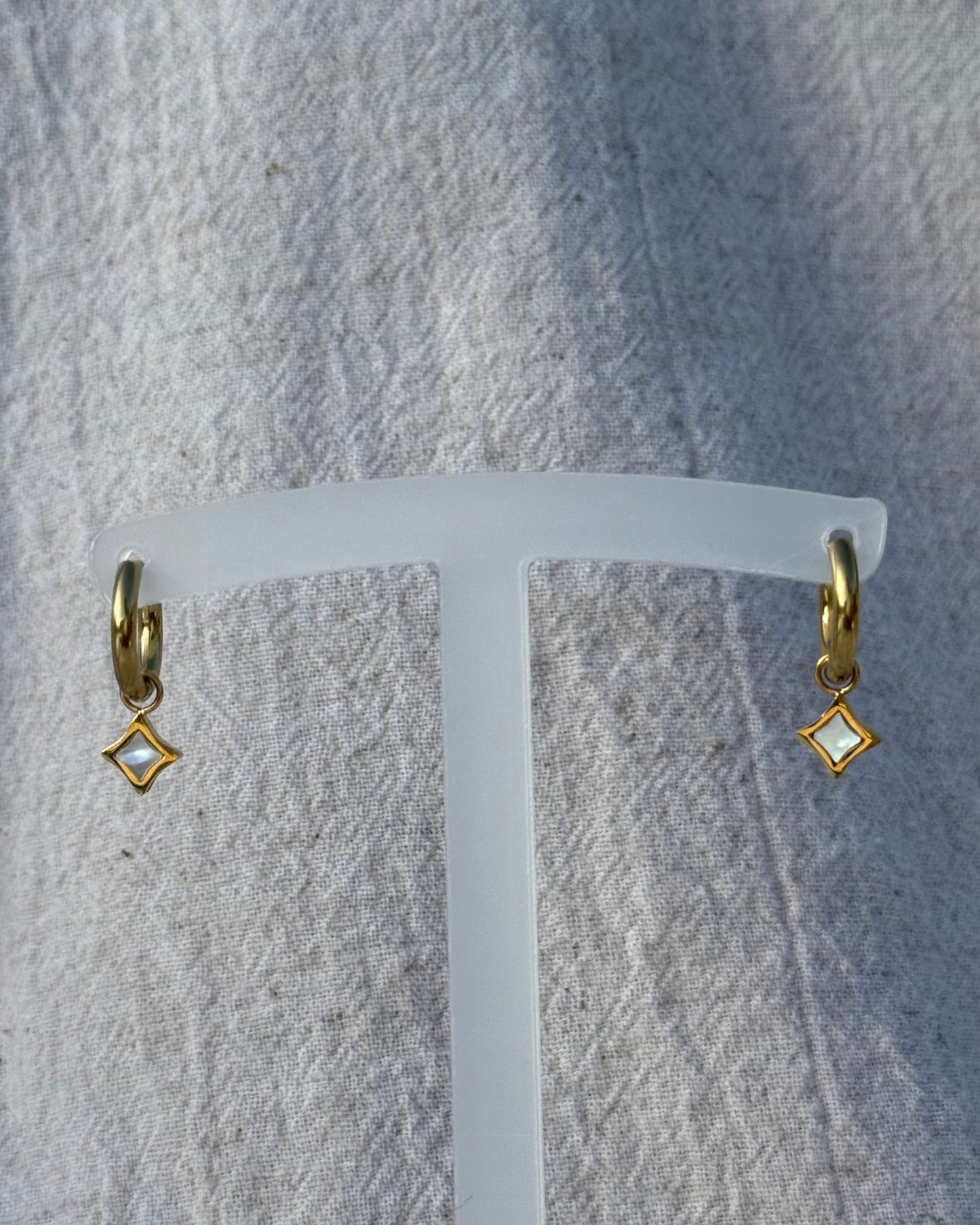 Nacar star earrings